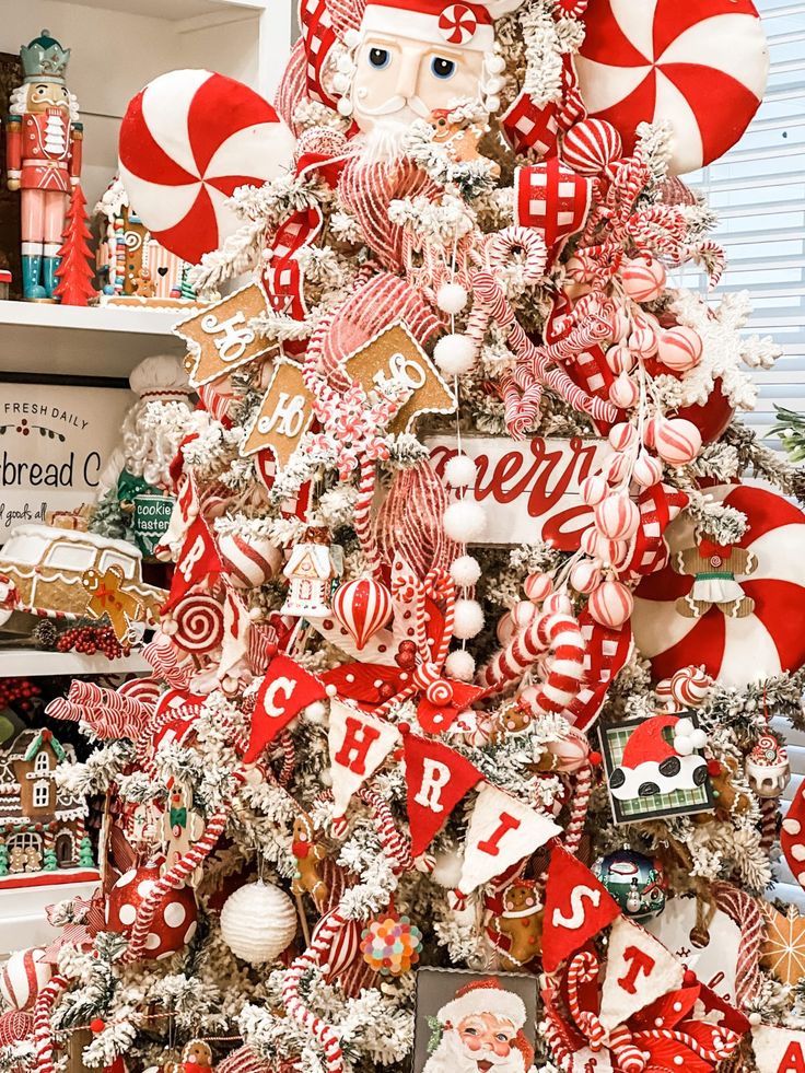 a christmas tree decorated with candy canes and candies