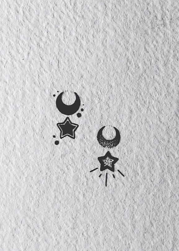 an image of some black and white objects on a piece of paper with the word love written