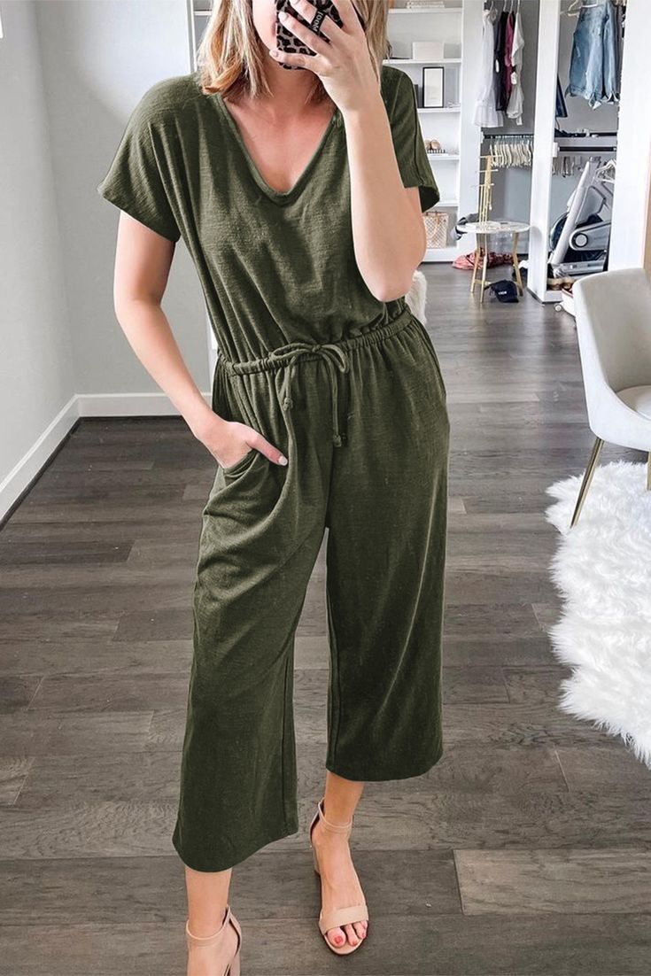 Green V Neck Short Sleeve Jumpsuit Casual V-neck Stretch Jumpsuits And Rompers, Casual V-neck Jumpsuit With Relaxed Fit, Casual Stretch Jumpsuits And Rompers For Spring, Casual Green Relaxed Fit Jumpsuits And Rompers, Casual Green Solid Color Jumpsuits And Rompers, Casual Short Sleeve Solid Color Jumpsuits And Rompers, Casual Short-sleeved Solid Color Jumpsuits And Rompers, Casual Stretch Jumpsuits And Rompers For Day Out, Green V-neck Jumpsuit For Loungewear