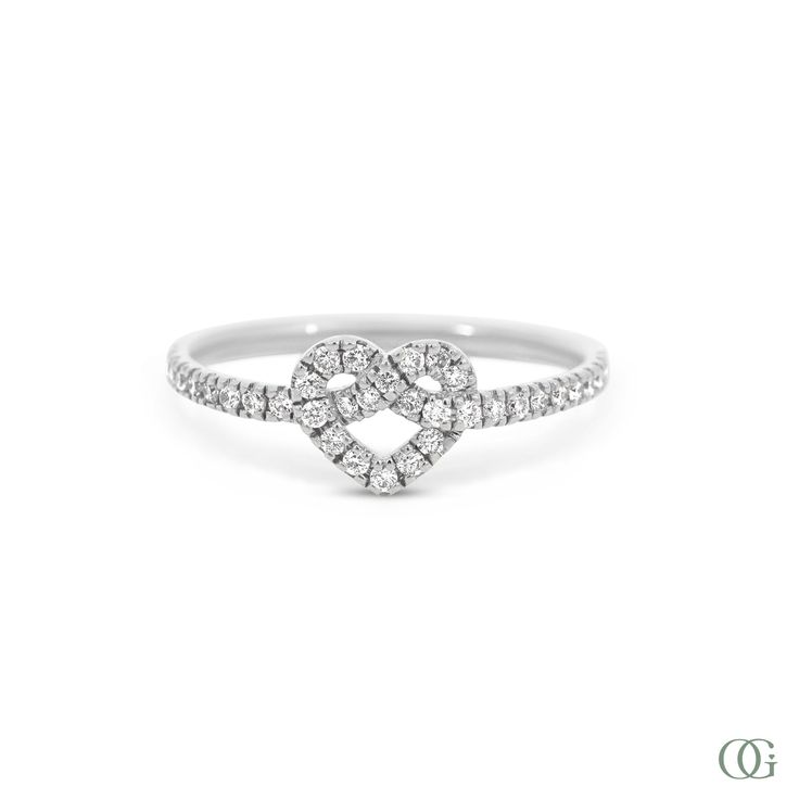 Experience the perfect combination of elegance and style with our Heart Elegance Diamond Fashion Ring. Featuring a unique heart-shaped design and sparkling diamonds, this ring is sure to make a statement. Elevate any outfit and showcase your sophisticated taste with this stunning piece. Stackable Engagement Ring, Diamond Fashion Rings, Tennis Necklace, Pear Shaped Diamond, Fashion Ring, Dainty Earrings, Diamond Fashion, Gold Platinum, Sparkle Diamonds