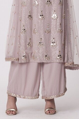 Mauve pink kurta with mirror embroidered buttas. Paired with an embroidered hem pant and dupatta. - Aza Fashions Pink Embellished Kurta For Festivals, Pink Embellished Festival Kurta, Embellished Palazzo Set For Navratri, Bollywood Style Pink Kurta With Sequins, Festive Pink Kurta With Sequins, Pink Sequined Kurta For Festivals, Pink Sequined Kurta For Eid, Pink Sequined Straight Kurta Set, Pink Bollywood Palazzo Set With Sequins