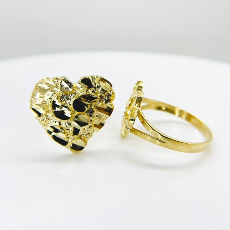 10k Solid Gold Nugget Heart Love Ring for Women/Girl * Metal : Real 10K Yellow Gold * Condition : Brand New * Finish : Polished * Width : X Small (8.6mm) / Small (11.0mm) / Medium (14.3mm) / Large (18.3mm) * Weight : 1.5 ~ 2.3 gram * Size : 4 ~ 13 * Processing time : 1~3 business days * Ships from California This is 100% Authentic 10k Gold. Not plated or filled. All of our items are brand new and are shipped with a gift box. Gold Nugget Ring, Hip Hop Rings, Engraved Wedding Rings, Style Hip Hop, Gold Nugget, Jewelry Lookbook, Heart Love, Girly Jewelry, Keep Jewelry