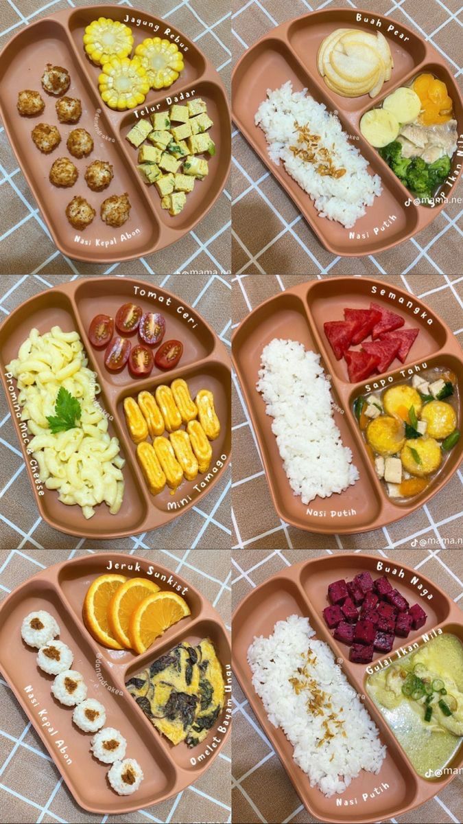 several trays filled with different types of food on top of a cloth covered table