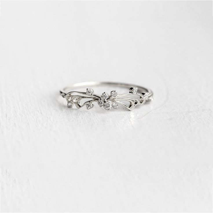 White Gold Flower Promise Ring Fine Jewelry, White Gold Flower Promise Ring, Silver Promise Rings With Rose Cut Diamonds, Exquisite Sterling Silver Promise Jewelry, Silver Cluster Ring With Rose Cut Diamonds For Promise, Exquisite 14k White Gold Promise Ring, Sterling Silver Rose Cut Diamond Jewelry For Promise, Sterling Silver Cluster Ring For Promise, Exquisite Sterling Silver Open Ring