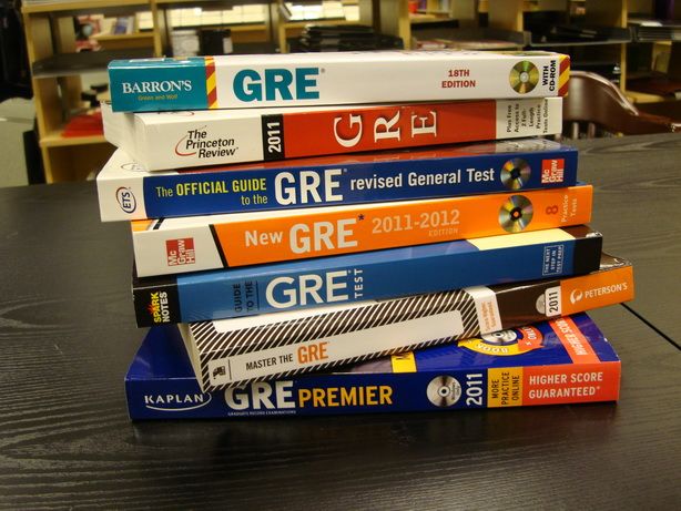 a stack of books sitting on top of a table