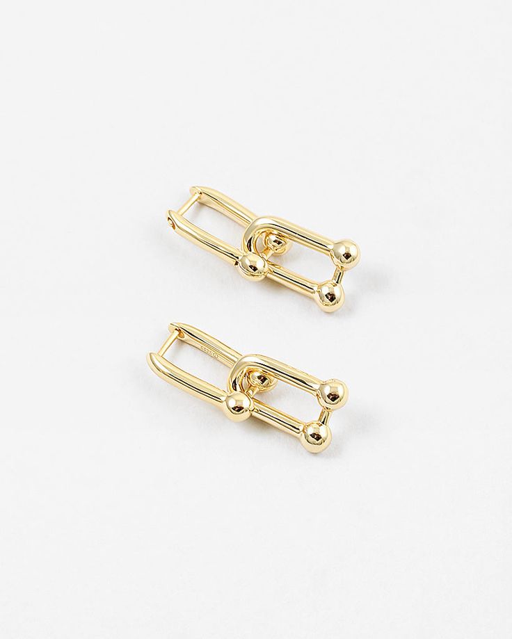 sterling silver | 925 | plain | link 1"h x 0.5"w 14k White Gold Linear Earrings, Modern Oval Link Earrings With Polished Finish, Modern Earrings With Polished Oval Link, Formal Tarnish Resistant Metal Huggie Earrings, Tarnish Resistant Yellow Gold Metal Clip-on Earrings, Yellow Gold Tarnish Resistant Metal Clip-on Earrings, Tarnish Resistant Yellow Gold Brass Earrings, Gold-tone 14k Gold Earrings, 14k Gold-tone Tarnish-resistant Earrings