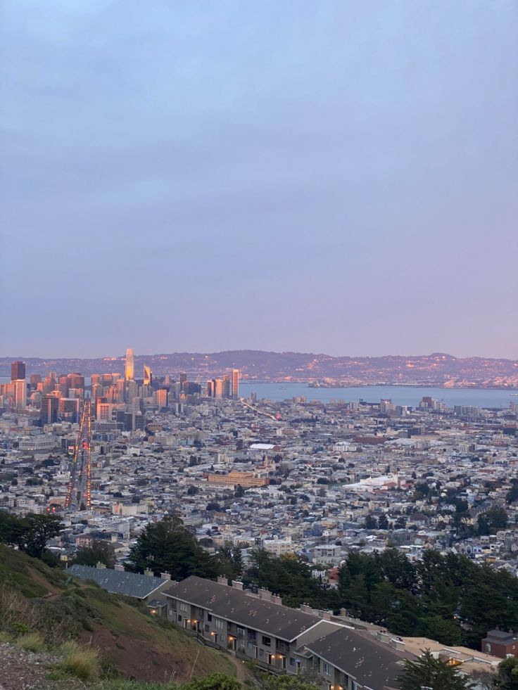 a view of a city from the top of a hill in san francisco, california