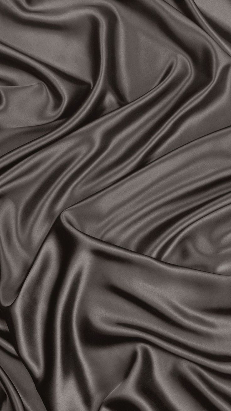 an image of a dark brown silk fabric texture that is very soft and smooth to the touch