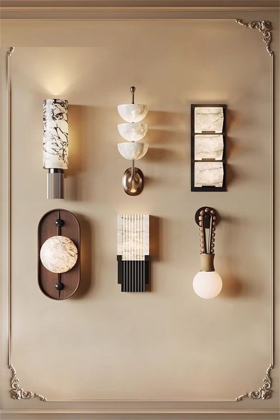 the wall is decorated with different types of lamps and lightshades, including one light fixture