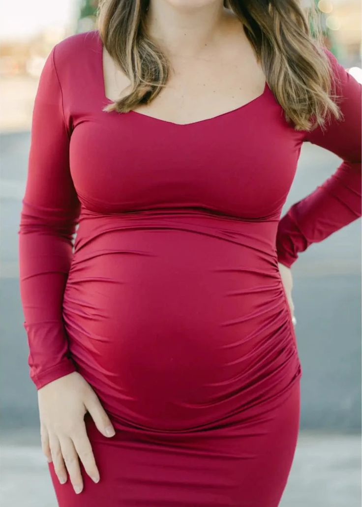 Introducing our luxurious ruched stretch dress with a flattering neckline and figure-hugging fit. This exquisite piece is a must-have in any maternity wardrobe, suitable for all stages of pregnancy and perfect for any special occasion.* 95% polyester, 5% elastane* mid-weight * Hand wash cold Elegant Fitted V-neck Maternity Dress, Fitted Long Sleeve Nursing-friendly Dress, Fitted Long Sleeve Nursing Friendly Dress, Ruched V-neck Maternity Dress, Maternity V-neck Dress With Ruched Details, Maternity V-neck Ruched Dress, V-neck Ruched Maternity Dress, Elegant Long Sleeve Bump Friendly Dress, Maternity Long Sleeve Ruched Dress