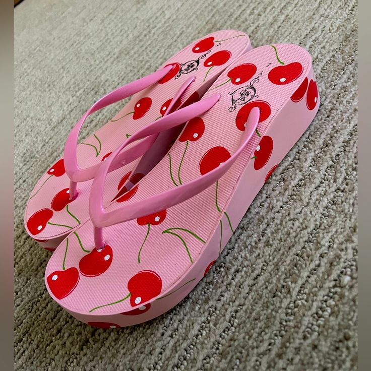 Cute Cherry Print Sandals! Approx 1.5in At Tallest Point. Comfy And Cute Size 7 But Might Fit 6.5 Best :) Brand New Never Worn Pink Platform Flip Flops For Summer, Pink Platform Flip Flops For Spring, Spring Platform Pink Flip Flops, Cute Summer Sandals With Eva Material, Cute Eva Flip Flops For Summer, Cute Red Sandals For Summer, Cute Red Sandals For The Beach, Cute Red Beach Sandals, Fun Synthetic Flip Flops For Spring