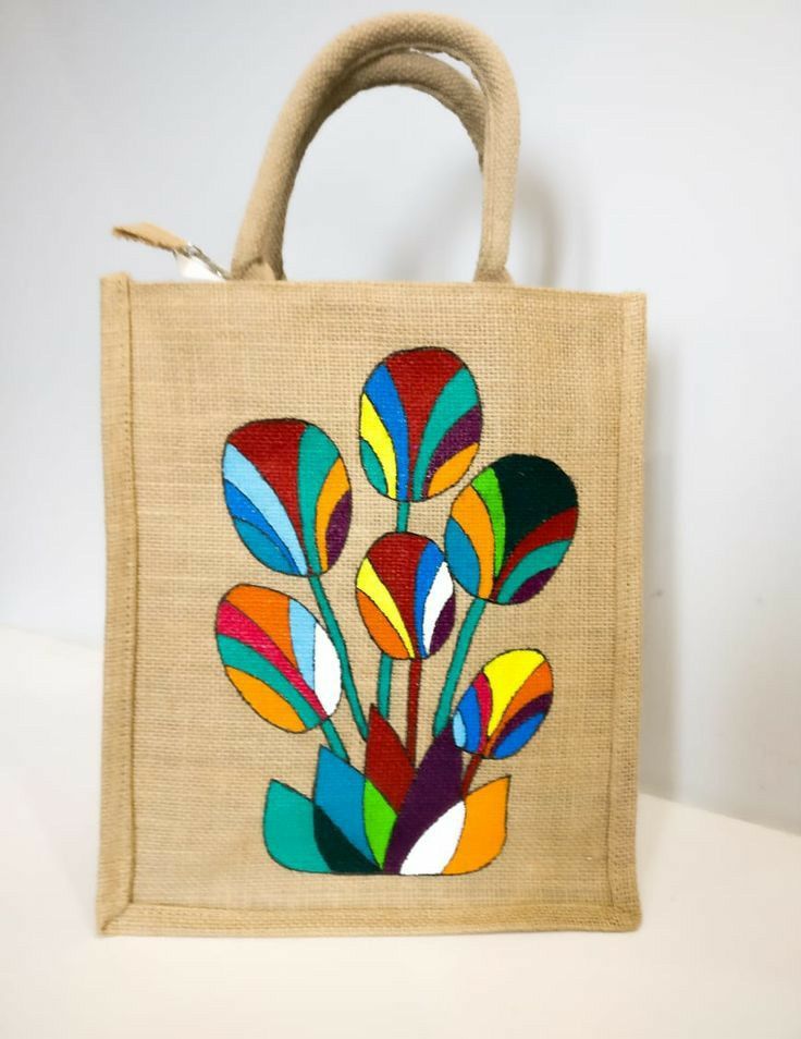 a bag with colorful flowers painted on it