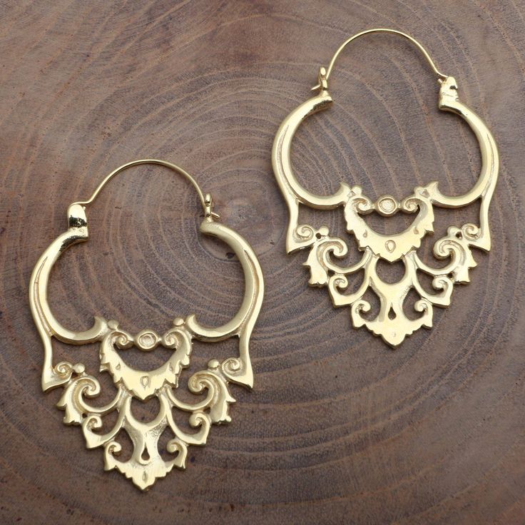 Baroque design and the warmth of polished gold capture both the eyes and the imagination in these glamorous hoop earrings. Made Nuada in Bali creates the design using 18k yellow gold over brass. Luxury Jewelry With Historical Baroque Design, Luxury Gold Sets With Intricate Design, Brass Cuff Bracelet, Heavy Earrings, Brass Hoop Earrings, Baroque Design, Vintage Jewelry Crafts, Geometric Jewelry, Baroque Fashion