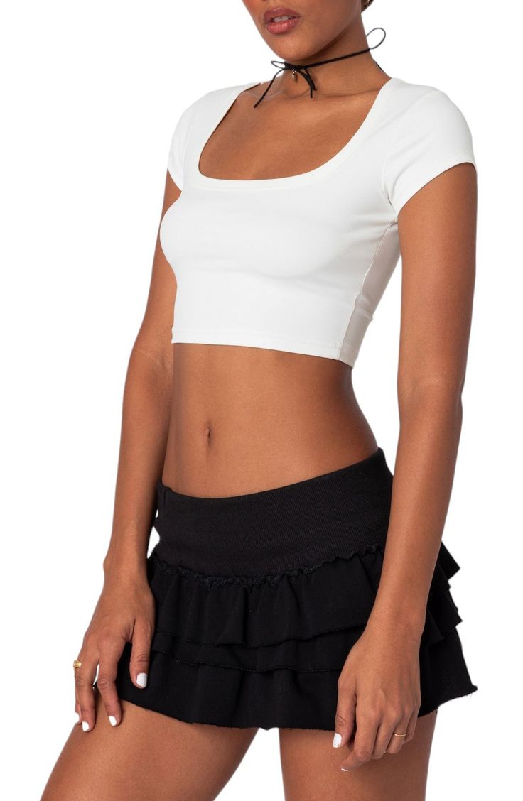 Sass is the style directive for this cute cropped top you'll wear when the temps rise. Square neck Short sleeves 80% polyester, 20% spandex Hand wash, dry flat Imported Sporty Fitted Crop Top T-shirt, Trendy Fitted Cropped T-shirt For Workout, White Stretch Crop Top With Crew Neck, White Stretch Crew Neck Crop Top, Medium Support Cropped Top For Spring, Sporty Scoop Neck Crop Top, Fitted Sporty Scoop Neck Crop Top, Seamless Fitted Cropped T-shirt For Summer, Cropped Tops With Medium Support For Spring