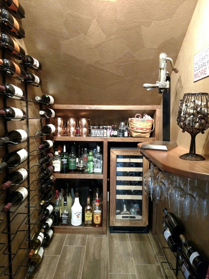 a wine cellar filled with lots of bottles