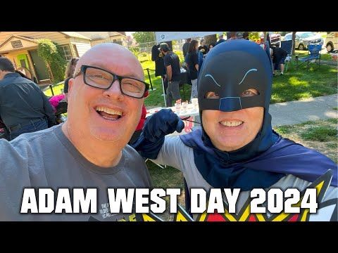 two men in batman costumes posing for a photo with the caption adam west day 2094