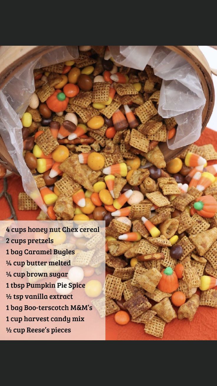 a bag full of cornflakes next to a pile of pumpkins and candy