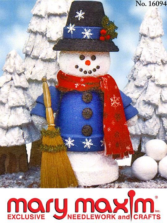 a christmas card with a snowman holding a broom