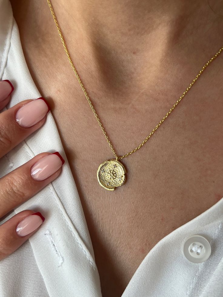 Find your direction with our Compass Necklace  Get this cute jewelry made with the high quality elements✨ You can go with 925K Sterling Silver with the options of Gold, Rose Gold or White Gold finish Beautiful jewelry for everyone 💙 Details * 925K Sterling Silver → 14K Gold, Rose Gold or White Gold plated * Chain length is approximately 18 inches (16+2 in extender) / 45 cm (40+5 cm extender) * Time is important! You will receive your package as soon as possible 🚚 * We care about the quality of Engraved Flower Pendant Jewelry For Everyday, Everyday Engraved Flower Pendant Jewelry, Delicate Tarnish Resistant Medallion Jewelry, Delicate Tarnish-resistant Medallion Jewelry, Sterling Silver Tarnish Resistant Medallion Necklace, Gold Sterling Silver Medallion Necklace For Everyday, Tarnish Resistant Sterling Silver Medallion Necklace, Delicate Amulet Chain Jewelry As Gift, Dainty Jewelry With Coin Pendant For Anniversary