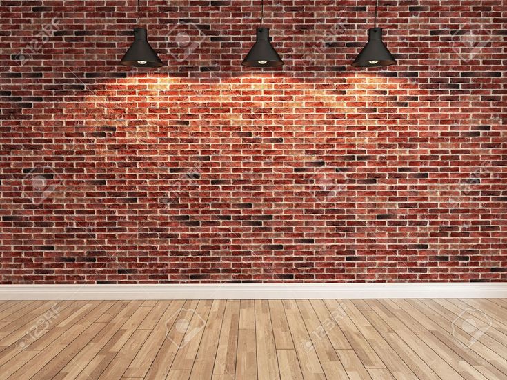 an empty room with brick wall and three lamps on the floor stock photo - 7897