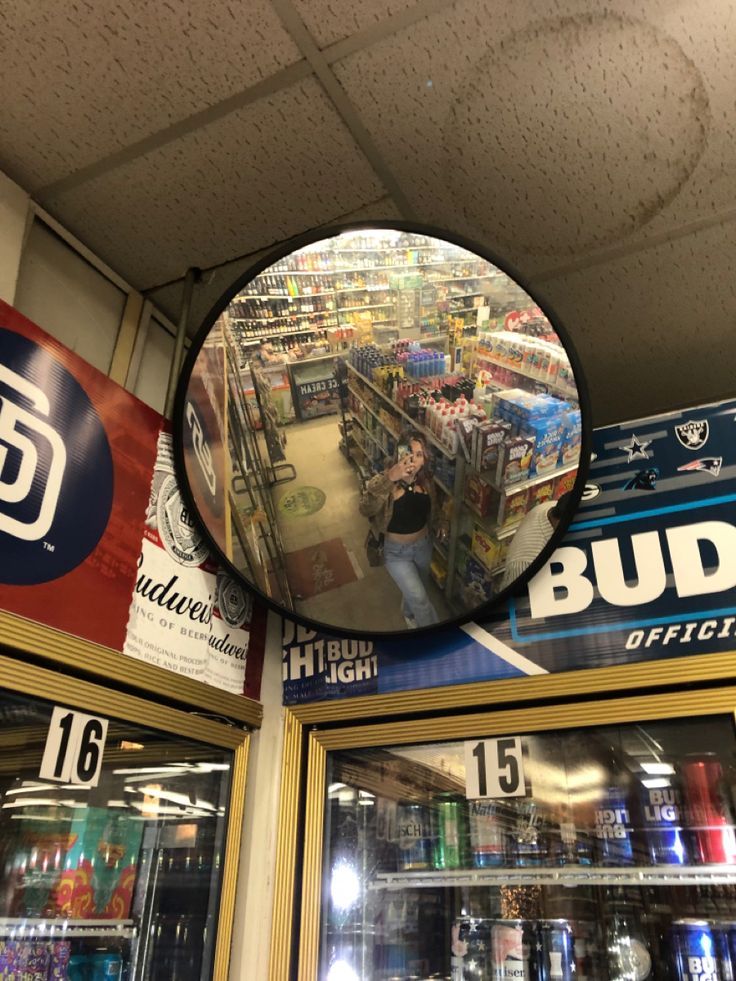 there is a mirror in the middle of a store