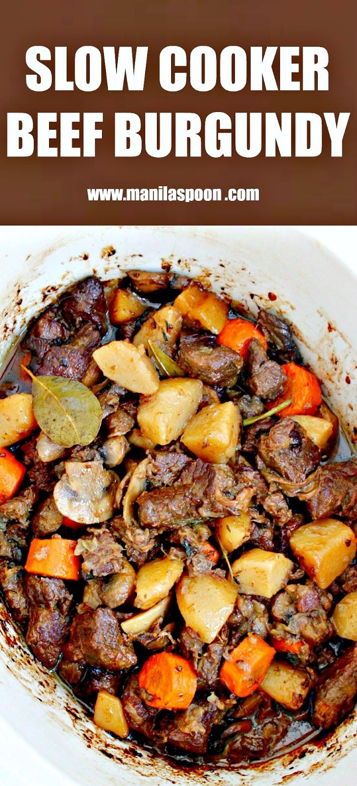 slow cooker beef burgundy with potatoes and carrots in a white bowl