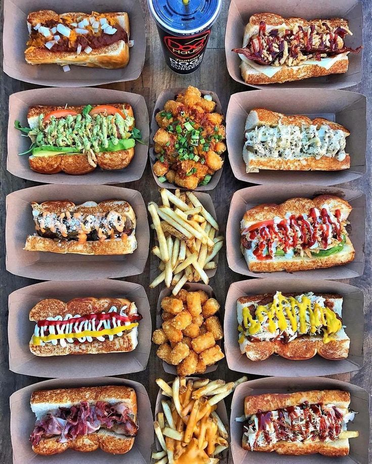 many different types of hot dogs and french fries