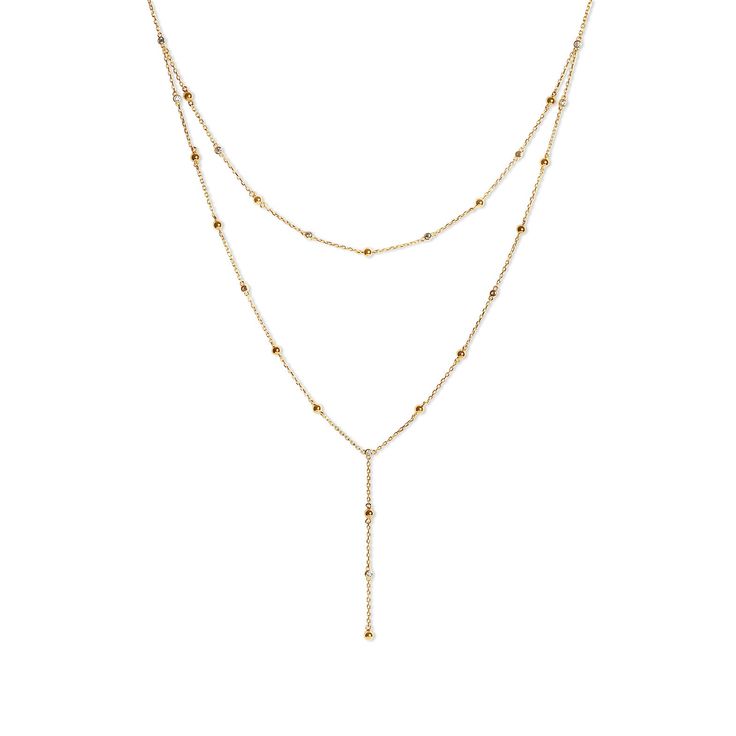 Introducing the Beaded Satellite Layered Lariat Necklace, your go-to accessory for effortless style. Featuring a delicate beaded drop chain and adjustable length, this necklace allows you to effortlessly create a chic, stacked look with no effort required. Upgrade your style with this versatile piece. Delicate Lariat Necklace For Layering, Adjustable Lariat Necklace For Layering, Elegant Dangle Lariat Necklace For Layering, Elegant Lariat Beaded Necklace For Layering, Adjustable Dangle Lariat Necklace For Layering, Chic Lariat Necklace With Adjustable Chain For Layering, Elegant Lariat Necklace With Dangling Beads, Chic Long Drop Necklace With Delicate Chain, Dainty Double Strand Beaded Necklaces For Layering