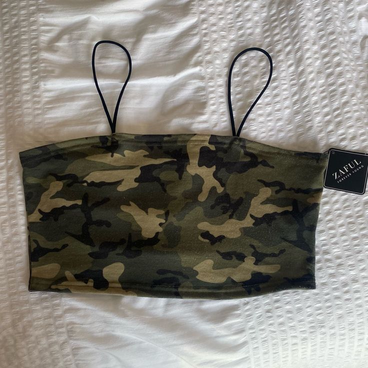 Zaful Camo Cropped Camisole Tank Size Xl Nwt Tag Is Attached But Top’s Material Seems Like It Has Pilling. It Was Purchased This Way. Add Free To Any Bundle. Tags: Camo, Camouflage, Crop Top, Bralette, Camisole, Soft, Tank Top, Summer, Spring, Winter, Fall, Casual, Everyday Wear, Comfy, Lounge Wear, Stretchy, New With Tags Please Ask If You Have Any Questions! Smoke Free Home! Ships Same Day Or The Next Day As Purchased! I Accept Most Offers! Bundle Items T O Get A Better Deal! All Sales Help Me Khaki Military Style Summer Top, Military Style Khaki Top For Summer, Sleeveless Camouflage Top For Spring, Fitted Camouflage Sleeveless Top, Fitted Sleeveless Camouflage Top, Sleeveless Camouflage Cotton Top, Summer Military Camouflage Tops, Summer Military Style Camouflage Tops, Military Style Camouflage Tops For Summer