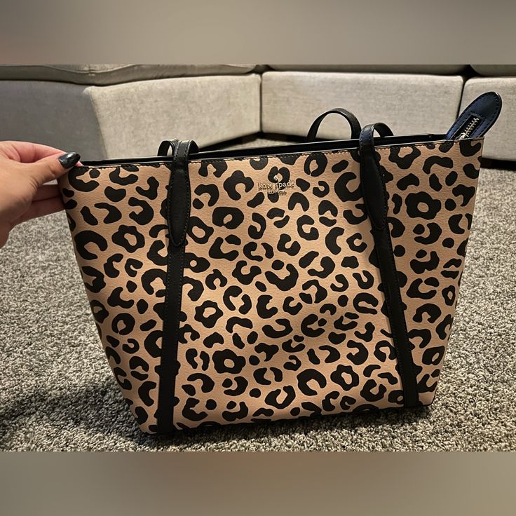 Leopard Print Kate Spade Tote Bag. Has One Zipper Pocket Inside And A Pocket In The Back. Kate Spade Brown Shoulder Bag For Errands, Kate Spade Brown Shoulder Bag With Gold-tone Hardware, Chic Leopard Print Bags For Errands, Kate Spade Brown Rectangular Shoulder Bag, Kate Spade Brown Shoulder Bag With Double Handle, Brown Kate Spade Shoulder Bag For Shopping, Kate Spade Brown Bag With Removable Pouch, Kate Spade Brown Shoulder Bag For Travel, Chic Leopard Print Shoulder Bag With Leather Handles