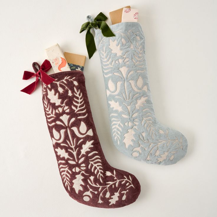 Hang these stockings, available in rich chestnut and serene blue hues, by the chimney with care. Crafted from soft cotton velvet and featuring a delicate cutwork pattern designed by our in-house team, each stocking comes with a charming velvet bow, adding a distinctive touch to complete the look. Anthropologie Christmas Stocking, Scandinavian Christmas Stocking, Luxury Christmas Stocking, Stocking Christmas Decor, Vintage Stockings Christmas, Plaid Stockings Christmas, Anthropologie Stocking, Embroidered Stockings Christmas, Christmas Stocking Embroidery