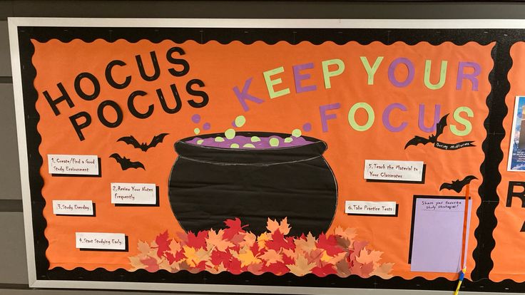 a bulletin board with writing on it that says hoccus pocus keep your focus