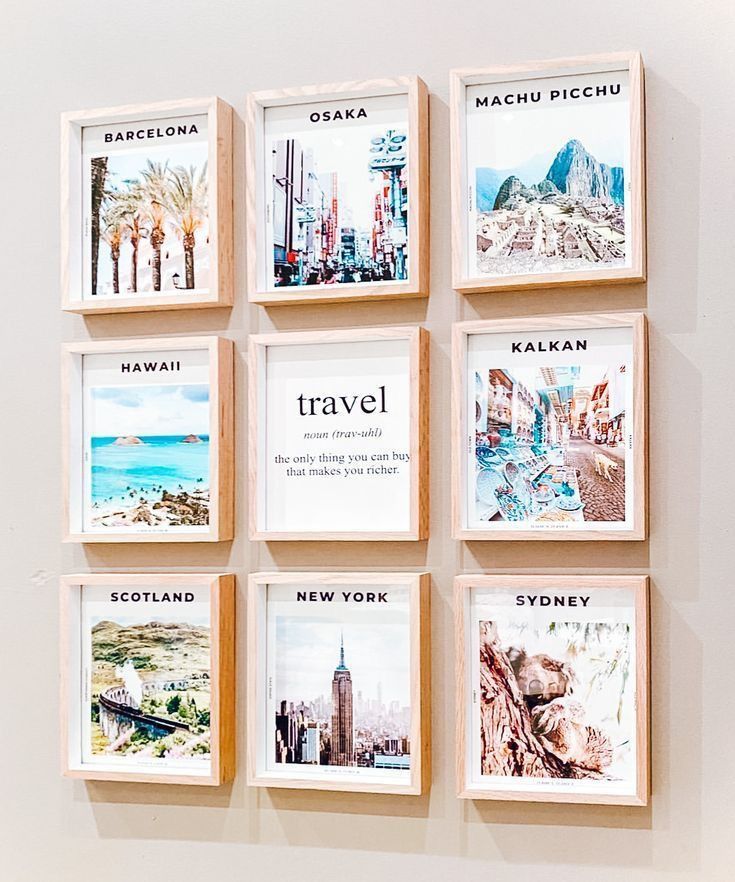 six framed pictures hang on the wall in front of a white wall that says travel