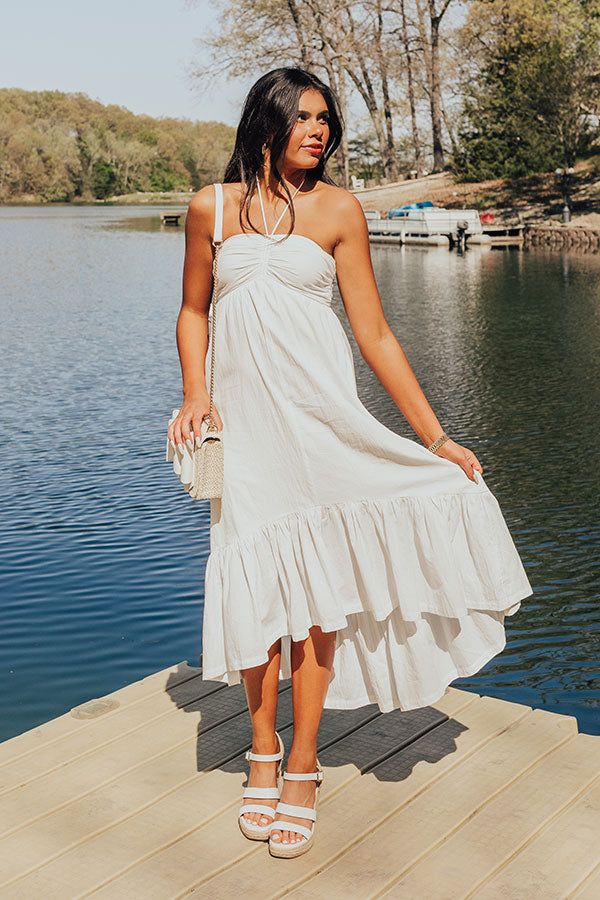 - Whether you are headed to a beachside brunch, a rooftop party, or a leisurely stroll through the park, this fabulous dress is your go-to choice for casual elegance! - Lightweight material - A built-in lining - A halter tied sweetheart neckline that goes down into a drawstring ruched detail - An interior non-slip strip - A smocked back - Functional side pockets - A flowy and flattering silhouette that ends in a ruffled high-low hemline Measurements S : Bust 26-28", Hip 42", Length 39", Slip Len Beachy Midi Dress For Brunch During Beach Season, Breezy Sundress For Beach Season Brunch, Summer Maxi Dress For Brunch And Vacation, Summer Vacation Maxi Dress For Brunch, Chic Maxi Beach Dress For Summer Parties, Summer Maxi Dress For Vacation Brunch, Chic Sundress For Beach Party In Summer, Breezy Maxi Dress For Beach Party In Spring, Summer Beach Dresses For Brunch