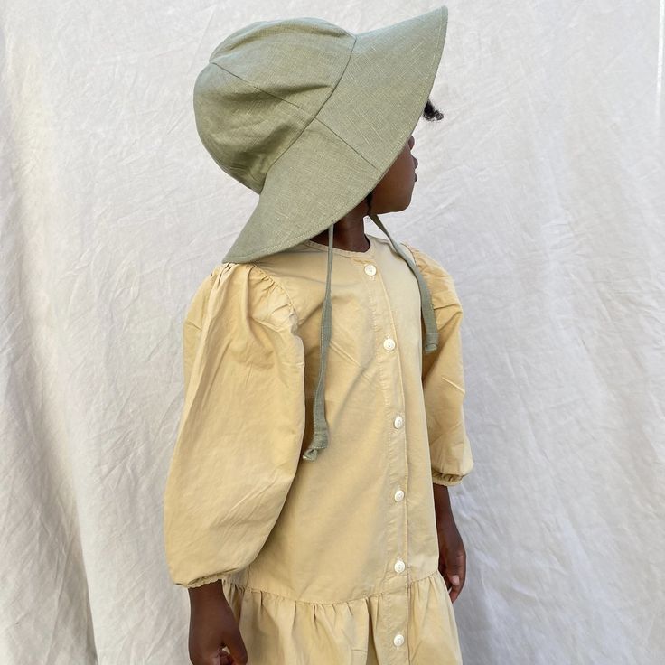 Child’s Linen Sun Hat | Matcha – Small Lot Co. Khaki Summer Hat For Spring, Khaki Bucket Hat For Spring, Khaki Wide Brim Sun Hat For Spring, Eco-friendly Spring Sun Hat With Curved Brim, Eco-friendly Curved Brim Sun Hat For Spring, Khaki Sun Hat For Beach In Spring, Spring Beach Sun Hat In Khaki, Spring Beach Khaki Sun Hat, Spring Beach Bucket Hat In Khaki