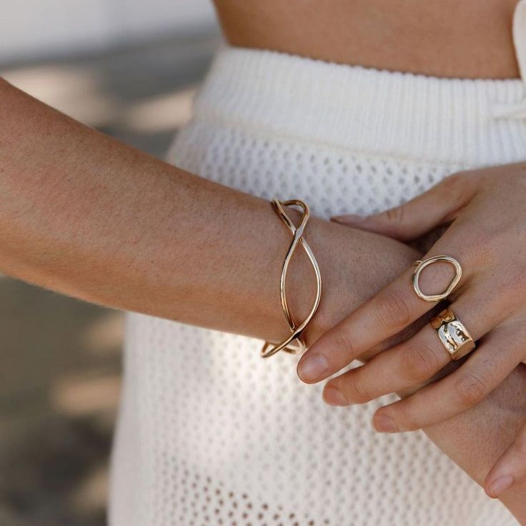 Classic design with a modern flair, our Cali Beach Waves Cuff is minimalist jewelry at its finest. This is the bracelet you will be grabbing day after day! Material: Copper Finish: Gold Plated, Silver Plated, Matte Black Last Chance = FINAL SALE Chic Everyday Bangle Bracelets, Trendy Infinity Jewelry, Chic Adjustable Bangle Jewelry, Modern Bracelets As Spring Gifts, Modern Bracelet For Spring Gift, Modern Spring Bracelets As Gifts, Modern Everyday Jewelry For Spring, Trendy Everyday Cuff Bangle Bracelet, Adjustable Bangle For Everyday