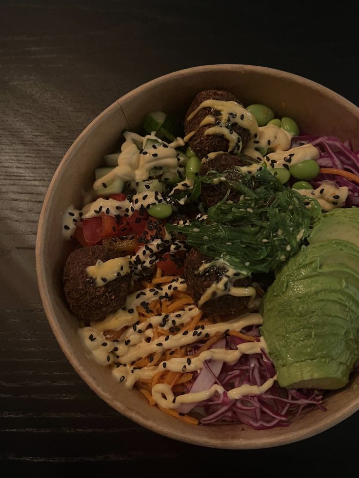 a bowl filled with lots of different types of food