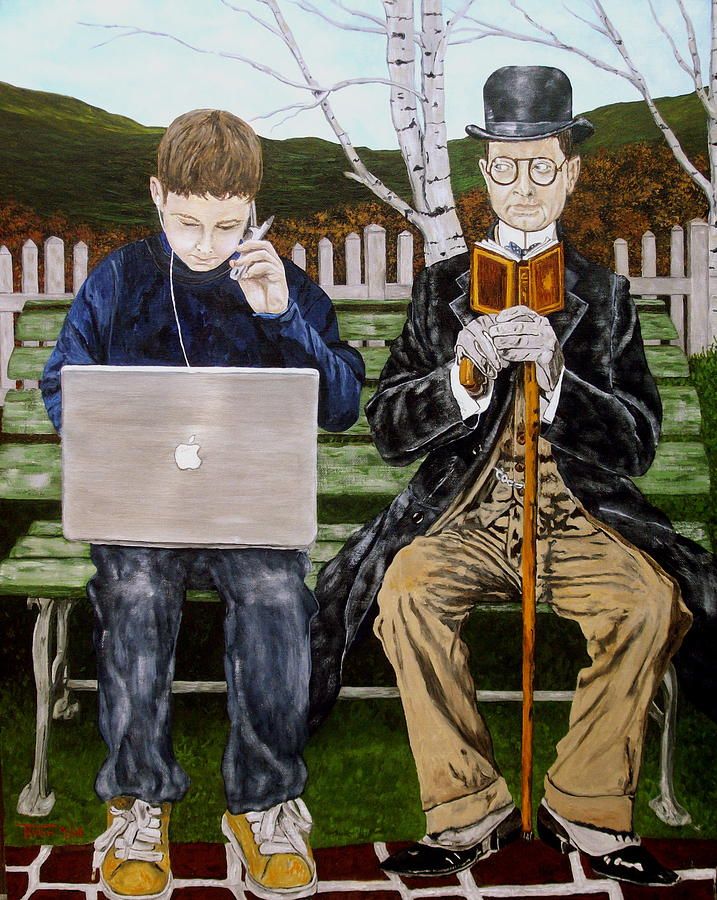 two men sitting on a park bench, one using a laptop and the other holding a book