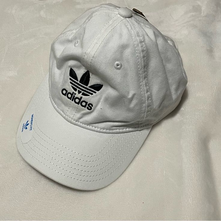 A Soft White Adidas Hat. New With Tags And Open To Offers Adidas Hats For Summer Streetwear, White Hats For Spring Streetwear, Adidas Cotton Hat With Curved Brim, Adidas Cotton Snapback Baseball Cap, Adidas Cotton Hats With Curved Brim, Adidas Casual Summer Hats, Sporty White Baseball Cap For Spring, Sporty White Hat For Spring, Trendy White Hat For Everyday Use