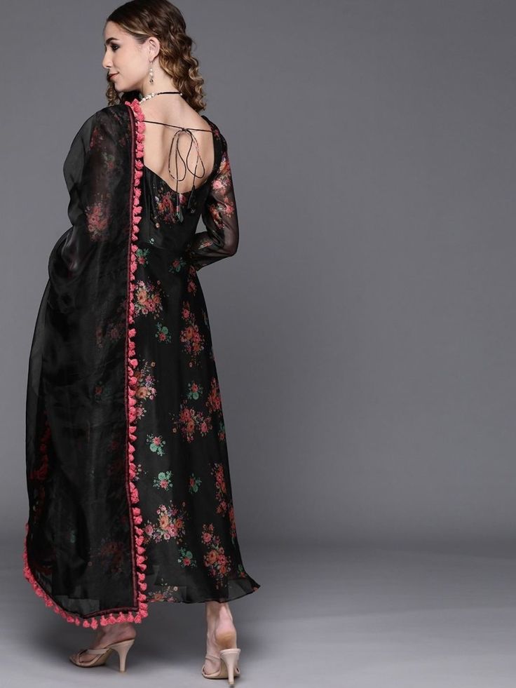 Buy irresistible black organza digital print kurta with pants and dupatta online at best price. This dazzling style kurta goes perfectly for upcoming diwali festive and grand events. This stunning set comprises a organza kurta with matching cotton blend bottom and organza dupatta. Black Organza Suit, Eid Organza Sets In Maxi Length, Black Long Sleeve Sets With Digital Print, Unstitched Sheer Dress For Party, Festive Organza Dress With Digital Print, Black Straight Kurta Anarkali Set For Party, Floral Print Georgette Salwar Kameez For Party, Black Anarkali Chanderi Palazzo Set, Black Anarkali Set For Party With Straight Kurta