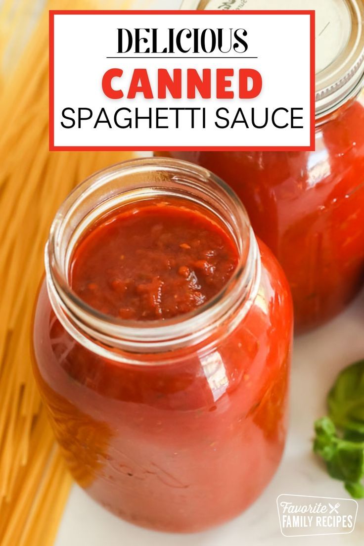 two jars filled with canned spaghetti sauce