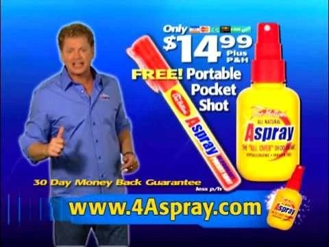 a man holding up a spray bottle and toothpaste in front of the tv screen