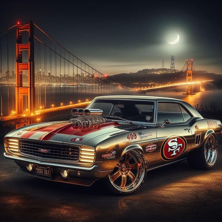 an old muscle car is parked in front of the golden gate bridge with san francisco on it's hood