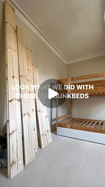 a bedroom with bunk beds made out of pallet wood and carpeted flooring that reads, look why we did with these bunk beds