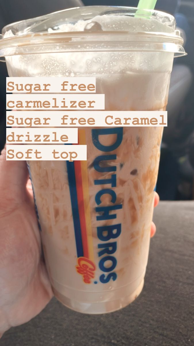 a person holding up a drink with the words sugar free caramel and sugar free caramel