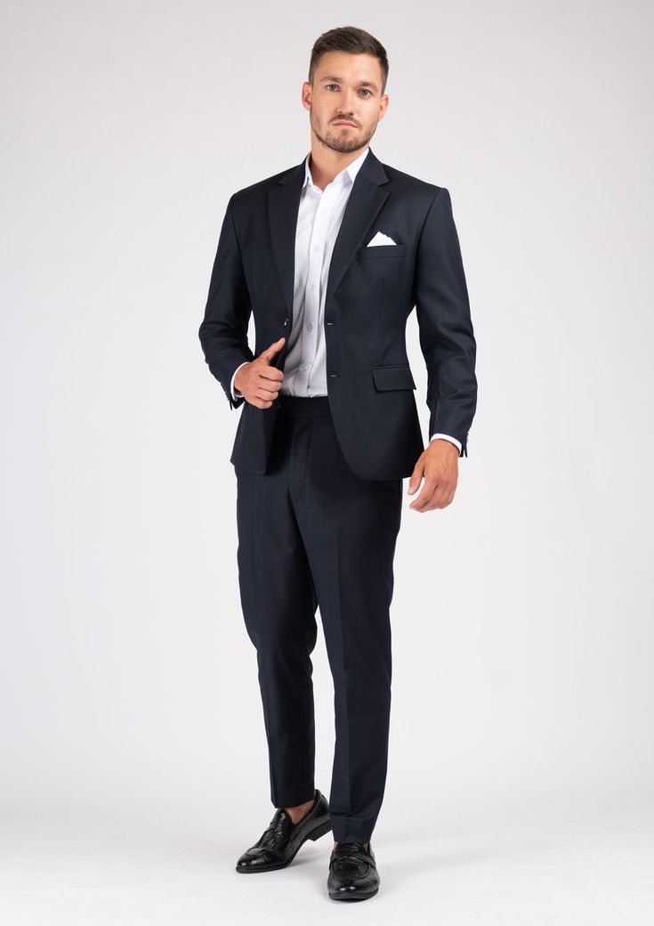 The Astor Dark Navy Twill Suit is an elegant and timeless professional wardrobe staple. Versatile for a variety of occasions, get ready to look your best in this custom made suit, wherever you wear it. Elegant Semi-formal Pantsuit With Pressed Crease, Wedding Three-piece Suit With Welt Pockets, Semi-formal Suit With Welt Pockets And Suit Collar, Semi-formal Suit With Welt Pockets, Classic Single-breasted Semi-formal Pantsuit, Classic Single-breasted Pantsuit For Semi-formal Occasions, Timeless Business Suit Set With Notch Lapel, Tailored Timeless Three-piece Suit For Workwear, Office Suits With Welt Pockets And Suit Collar