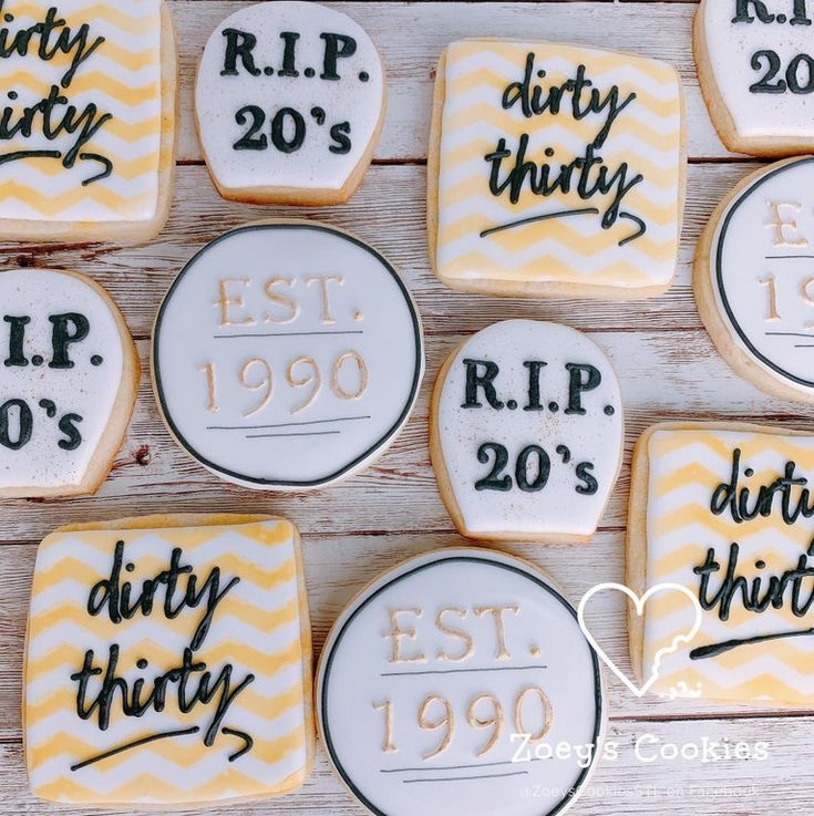 decorated cookies with the words dirty thirty are arranged on a table