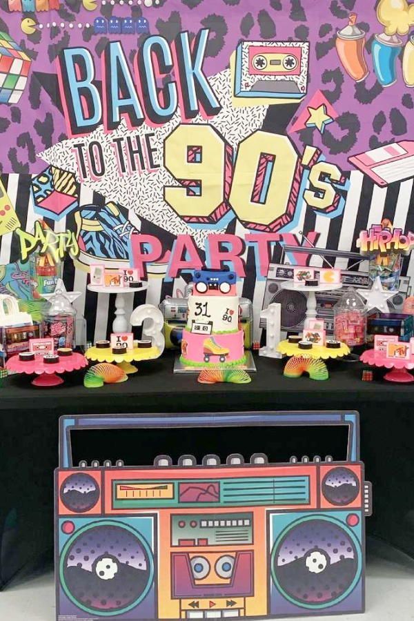 an old school party with boomboxs and decorations