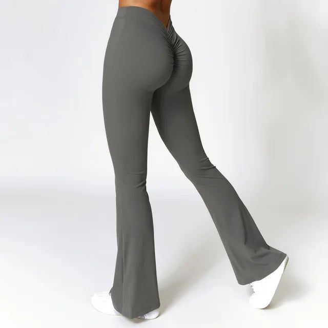 Designed for maximum flexibility and comfort during yoga sessions, our Flare Leggings feature a unique V-Shaped Hip design. This allows for a flattering fit while providing support and coverage. Say goodbye to discomfort and hello to style with these leggings. Yoga Flare Pants, Cut Leggings, Legging Sport, Bell Bottom Pants, Flare Trousers, Flare Leggings, Sports Leggings, Yoga Leggings, Flare Pants