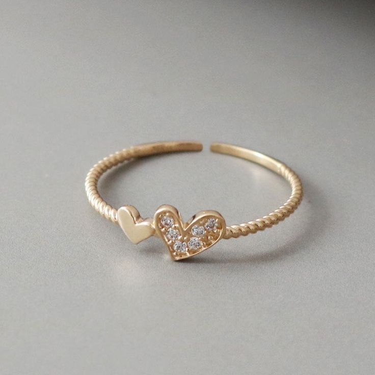 Material Gold Vermeil: 18k Gold Plated over Solid Sterling Silver Base Cubic Zirconia Size Open Design Ring: Size 5+ // window.dataLayer = window.dataLayer || []; function gtag(){dataLayer.push(arguments);} gtag('js', new Date()); gtag('config', 'UA-172659890-2'); // ]]> Heart To Heart, Silver Heart Ring, Open Design, Unique Charms, Jewelry Pouch, Jewelry Gift Box, Gold Plated Jewelry, Jewelry Plate, Silver Heart